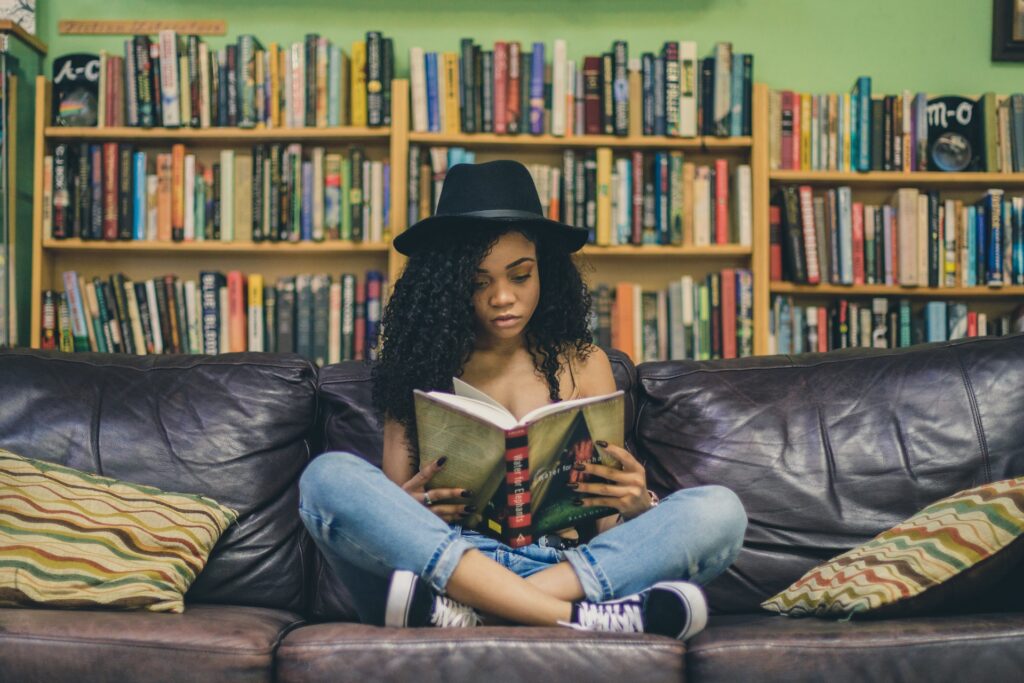 Woman reading for writing inspiration