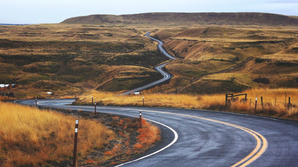 the winding roads when motivation is lacking - Photo by Jesse Bowser on Unsplash