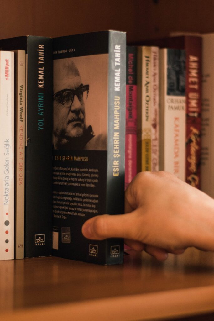 Browsing a book blurb - Photo by Levent Simsek for Pexels